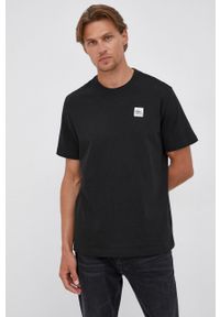 Lacoste T-shirt bawełniany kolor czarny gładki. Okazja: na co dzień. Kolor: czarny. Materiał: bawełna. Wzór: gładki. Styl: casual