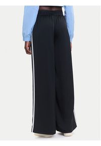 Adidas - adidas Spodnie dresowe adicolor Satin IU2520 Czarny Wide Leg. Kolor: czarny. Materiał: syntetyk #4