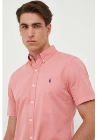 Polo Ralph Lauren koszula bawełniana męska kolor różowy regular z kołnierzykiem button-down. Okazja: na co dzień. Typ kołnierza: button down, polo. Kolor: różowy. Materiał: bawełna. Długość rękawa: krótki rękaw. Długość: krótkie. Wzór: aplikacja. Styl: casual #1