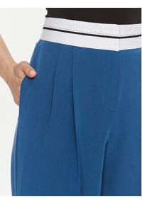 Hugo Spodnie materiałowe Hasiya 50505370 Niebieski Relaxed Fit. Kolor: niebieski. Materiał: wiskoza #2