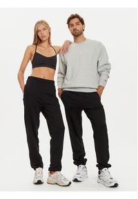 4f - 4F Spodnie dresowe Unisex 4FWAW24TTROU0826 Czarny Loose Fit. Kolor: czarny. Materiał: bawełna #3