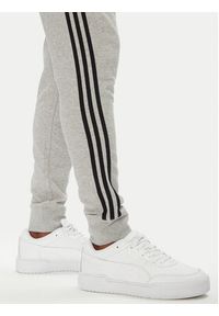 Adidas - adidas Spodnie dresowe adicolor 3-Stripes JY1387 Szary Slim Fit. Kolor: szary. Materiał: bawełna, syntetyk #4
