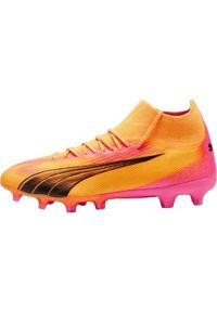 Buty piłkarskie męskie Puma Ultra Pro. Zapięcie: bez zapięcia. Kolor: żółty, czarny, różowy, wielokolorowy. Materiał: materiał, syntetyk. Szerokość cholewki: normalna. Sport: piłka nożna #1