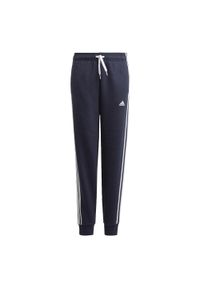 Adidas - Spodnie dla dzieci adidas Essentials 3 Stripes Pant granatowe GQ8898. Kolor: czarny, biały, wielokolorowy. Materiał: dresówka. Sport: joga i pilates