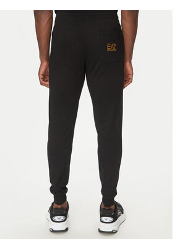 EA7 Emporio Armani Spodnie dresowe 7M000571 AF13512 MC004 Czarny Regular Fit. Kolor: czarny. Materiał: bawełna
