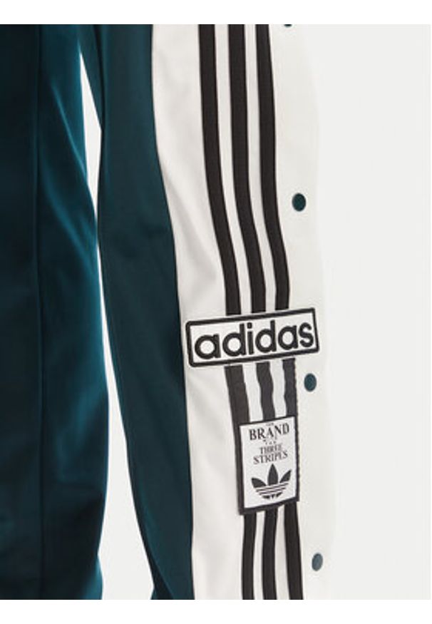 Adidas - adidas Spodnie dresowe Adibreak JV7515 Zielony Loose Fit. Kolor: zielony. Materiał: syntetyk