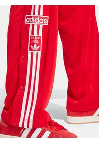 Adidas - adidas Spodnie dresowe Adibreak IY9924 Czerwony Loose Fit. Kolor: czerwony. Materiał: syntetyk #4