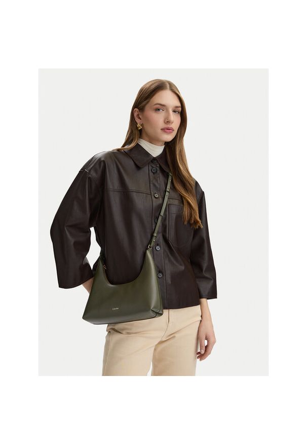 Torebka Calvin Klein. Kolor: beżowy