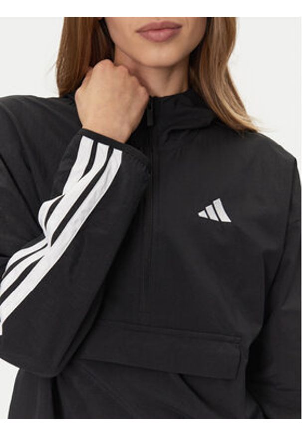 Adidas - adidas Wiatrówka Essentials 3-Stripes JE1312 Czarny Regular Fit. Kolor: czarny. Materiał: syntetyk