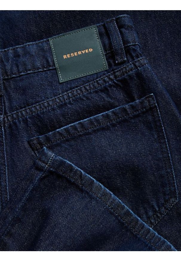 Reserved - Jeansy wide leg - granatowy. Kolor: niebieski