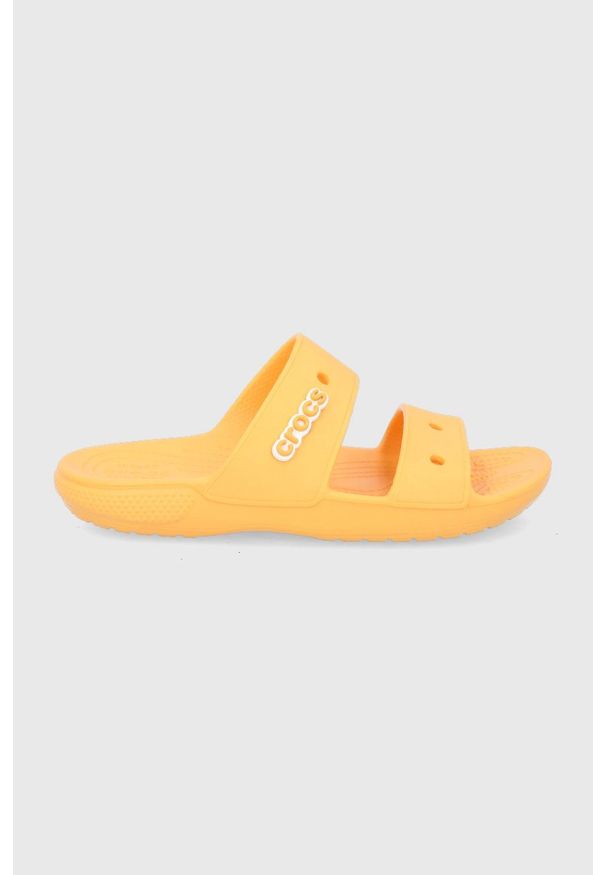 Crocs Klapki damskie kolor pomarańczowy. Kolor: pomarańczowy. Materiał: materiał, guma. Wzór: gładki. Obcas: na obcasie. Wysokość obcasa: niski