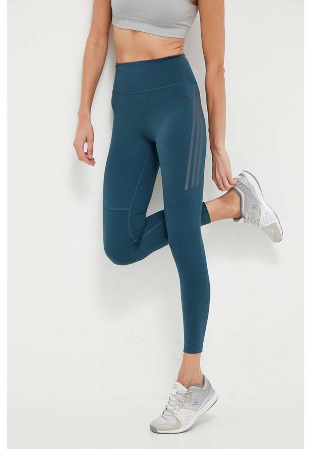 adidas Performance legginsy do biegania DailyRun kolor zielony z nadrukiem. Kolor: zielony. Materiał: materiał, skóra. Wzór: nadruk
