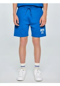 Big-Star - Szorty chłopięce dresowe ciemnoniebieskie Baron 402. Okazja: na co dzień. Kolor: niebieski. Materiał: dresówka. Wzór: nadruk, aplikacja. Styl: sportowy, casual, młodzieżowy #1