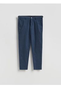 Reserved - Spodnie chino slim - granatowy. Kolor: niebieski. Materiał: tkanina, bawełna