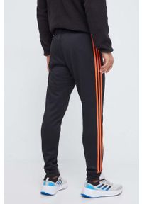 adidas Originals spodnie dresowe kolor czarny z aplikacją. Kolor: czarny. Materiał: dresówka. Wzór: aplikacja #2