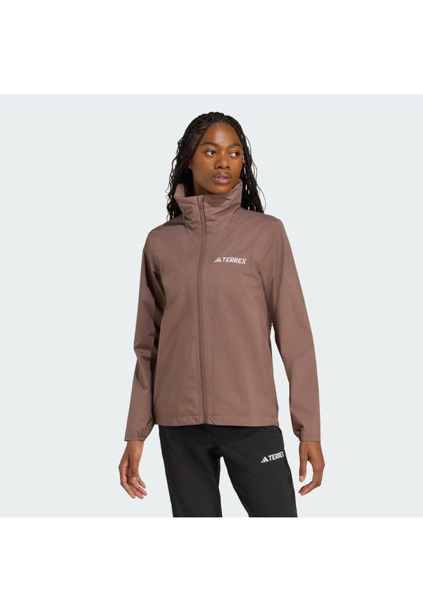 Adidas - Kurtka przeciwdeszczowa Multi Essentials 2L. Kolor: brązowy, beżowy, wielokolorowy. Technologia: ClimaProof (Adidas). Sport: turystyka piesza