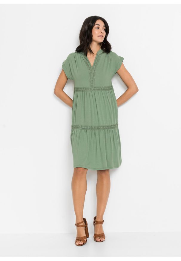 bonprix - Sukienka tunikowa z koronką. Kolor: zielony. Materiał: koronka. Wzór: koronka