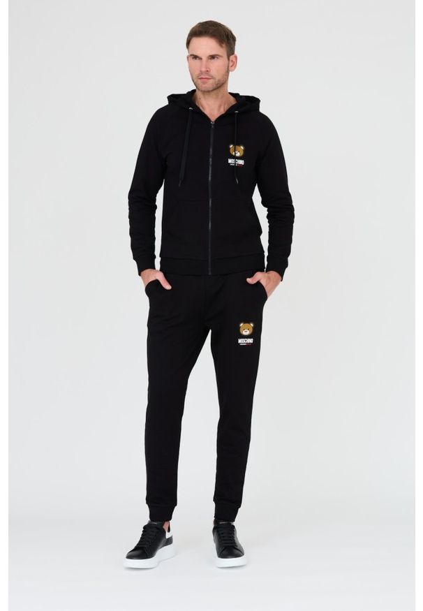 MOSCHINO Czarne spodnie dresowe. Kolor: czarny. Materiał: dresówka