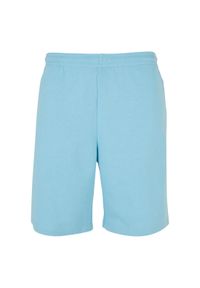 Szerokie spodenki dresowe z frotte Urban Classics. Kolor: niebieski. Materiał: dresówka. Długość: krótkie. Sezon: lato #1