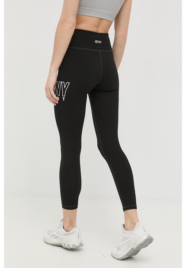 DKNY - Dkny legginsy damskie kolor czarny z nadrukiem. Kolor: czarny. Materiał: skóra. Wzór: nadruk