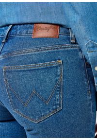 Wrangler - DAMSKIE SPODNIE WRANGLER BOOTCUT VINTAGE BLUE 112356394. Styl: vintage #4