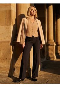Sinsay - Eleganckie spodnie - czarny. Kolor: czarny. Materiał: elastan. Styl: elegancki #1