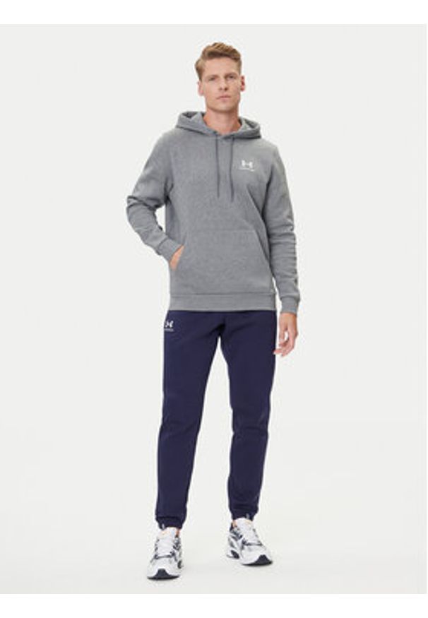 Under Armour Spodnie dresowe UA Essential Fleece Jogger 1373882 Granatowy Regular Fit. Kolor: niebieski. Materiał: bawełna