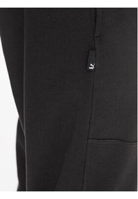 Puma Spodnie dresowe Downtown 621287 01 Czarny Regular Fit. Kolor: czarny. Materiał: bawełna