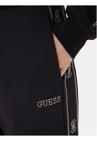 Guess Spodnie dresowe V5BB23 KCX22 Czarny Wide Leg. Kolor: czarny. Materiał: syntetyk #2