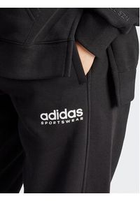 Adidas - adidas Spodnie dresowe All SZN Fleece Graphic HZ5802 Czarny Loose Fit. Kolor: czarny. Materiał: bawełna #4