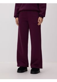 Reserved - Spodnie dresowe - ciemnofioletowy. Kolor: fioletowy. Materiał: dresówka #1