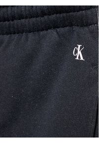 Calvin Klein Jeans Spodnie dresowe All Over Gradient IU0IU00332 Fioletowy Regular Fit. Kolor: fioletowy. Materiał: bawełna. Wzór: gradientowy #3