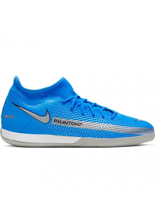 Buty piłkarskie Nike Phantom Gt Academy Df Ic Jr CW6693 400 niebieskie niebieskie. Zapięcie: sznurówki. Kolor: niebieski. Materiał: syntetyk, guma. Szerokość cholewki: normalna. Sport: piłka nożna