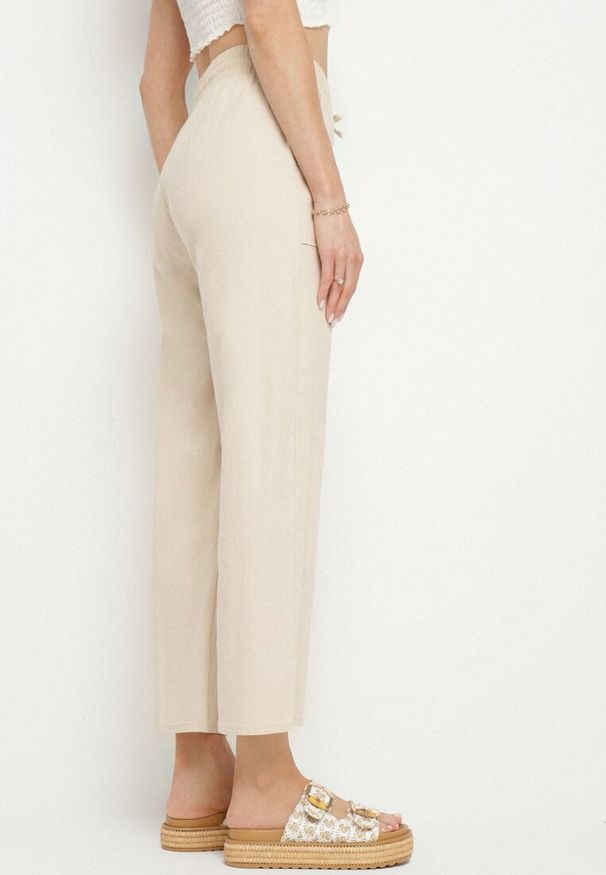 Born2be - Beżowe Spodnie z Bawełny Ozdobione Wiązaniem Davione. Okazja: na co dzień. Kolor: beżowy. Materiał: bawełna. Wzór: aplikacja. Styl: casual, elegancki