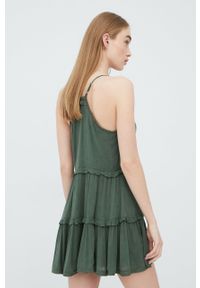 Superdry sukienka kolor zielony mini rozkloszowana. Kolor: zielony. Długość rękawa: na ramiączkach. Typ sukienki: rozkloszowane. Długość: mini