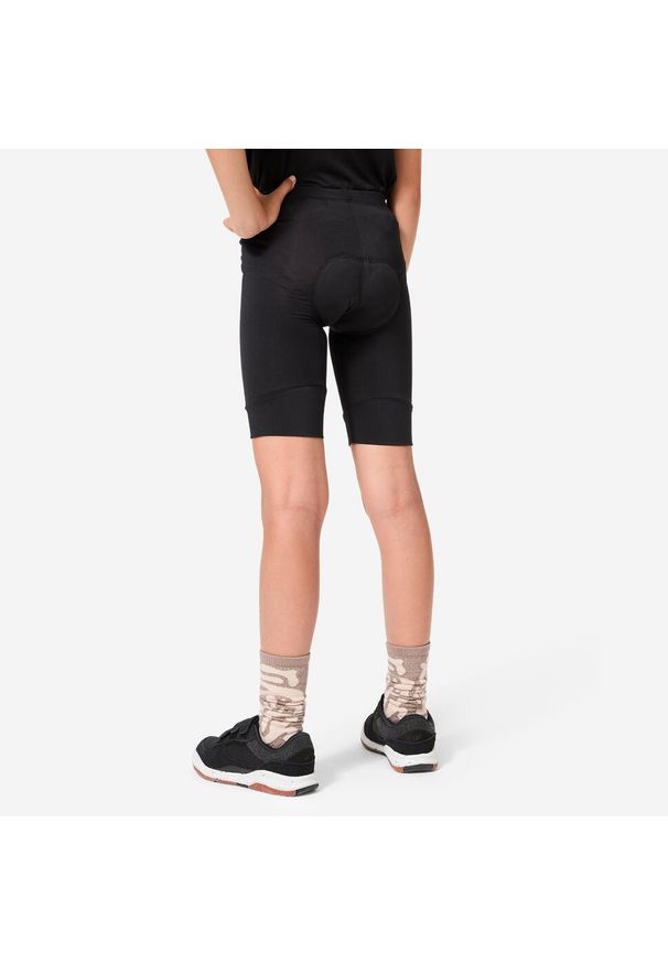 BTWIN - Spodenki rowerowe dla dzieci Btwin 100. Kolor: czarny. Materiał: elastan, poliester, materiał. Styl: sportowy. Sport: kolarstwo