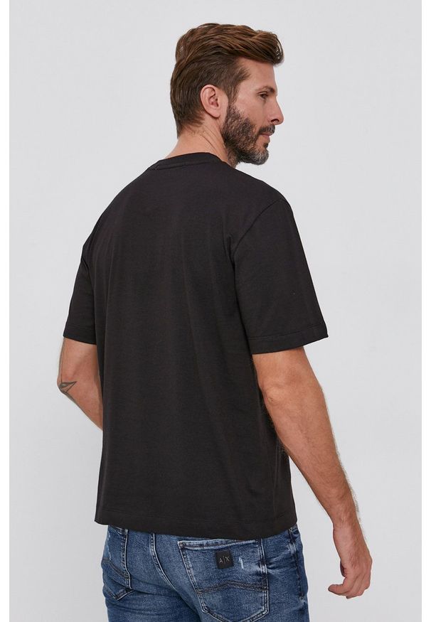 Calvin Klein Jeans - T-shirt bawełniany. Okazja: na co dzień. Kolor: czarny. Materiał: bawełna. Wzór: gładki. Styl: casual