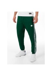 PITBULL - Spodnie męskie Oldschool Tape Logo. Kolor: zielony. Sport: fitness #1
