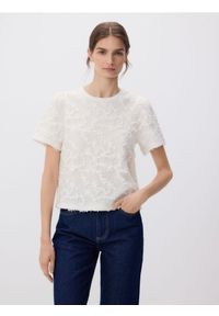 Reserved - Bluzka z aplikacjami - złamana biel. Materiał: dzianina. Wzór: aplikacja