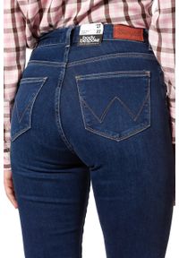 Wrangler - WRANGLER HIGH SKINNY COSY FEEL W27HRL21L 112128114. Stan: podwyższony. Wzór: aplikacja, jednolity
