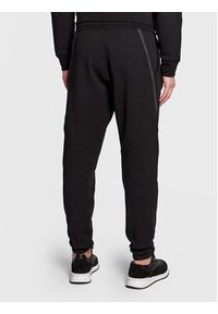 Calvin Klein Spodnie dresowe K10K110820 Czarny Regular Fit. Kolor: czarny. Materiał: dresówka, bawełna #4