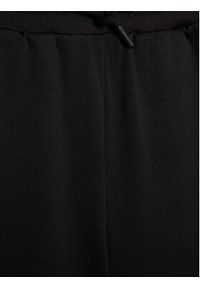 Calvin Klein Jeans Spodnie dresowe Shadow Logo IB0IB01010 Czarny Regular Fit. Kolor: czarny. Materiał: syntetyk #3