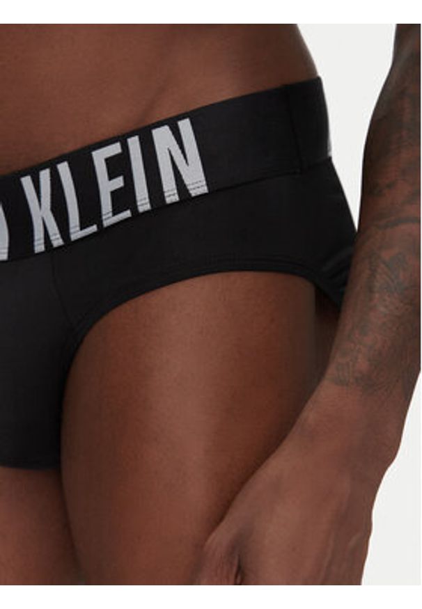 Calvin Klein Underwear Komplet 3 par slipów 000NB3610A Kolorowy. Materiał: syntetyk. Wzór: kolorowy