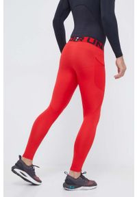Under Armour legginsy treningowe kolor czerwony gładkie. Kolor: czerwony. Materiał: skóra, materiał. Wzór: gładki #2