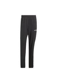 Adidas - Spodnie Multi Essentials Stretch. Kolor: czarny. Materiał: materiał