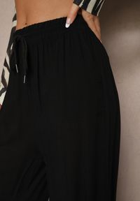 Renee - Czarne Szerokie Spodnie z Bawełną na Gumce z Kieszeniami Efridessa. Okazja: na co dzień. Stan: podwyższony. Kolor: czarny. Materiał: bawełna. Styl: klasyczny, casual
