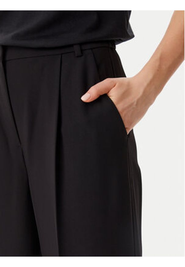 Calvin Klein Spodnie materiałowe Travel Twill K20K208214 Czarny Wide Leg. Kolor: czarny. Materiał: syntetyk