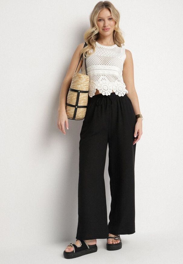 Born2be - Czarne Spodnie o Szerokim Kroju Palazzo z Wysokim Stanem i Wiązaniem Araloria. Okazja: na co dzień. Stan: podwyższony. Kolor: czarny. Styl: elegancki, casual