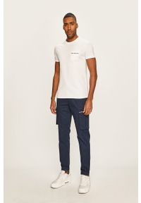 Tommy Jeans - Spodnie. Kolor: niebieski. Materiał: tkanina, bawełna, materiał, elastan. Wzór: gładki #4