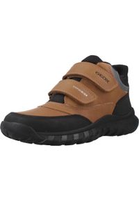 Geox - Buty GEOX J SIMBYOS BOY B ABX Brązowy. Kolor: brązowy. Materiał: syntetyk, tkanina. Sport: turystyka piesza